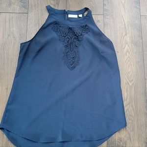 Sleeveless blue dressy top